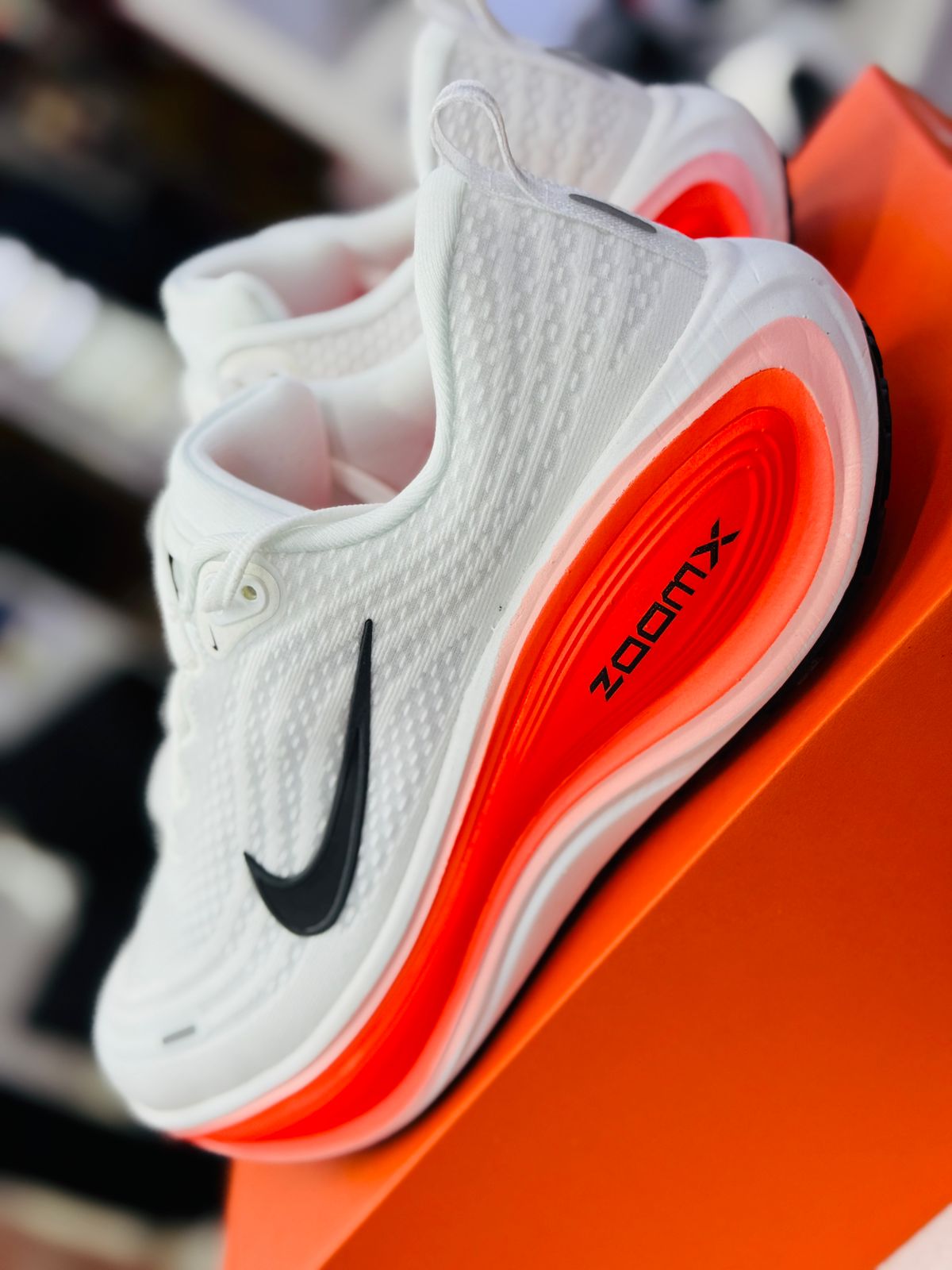 Nike ZoomX Vomero Running Sneakers – White/Crimson