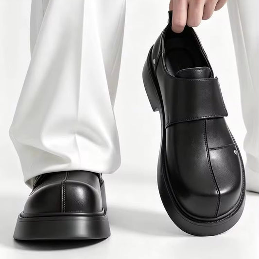 Black platform loafer shoe, with the other shoe worn. The brand name ZCZ is visible in the top left corner.
