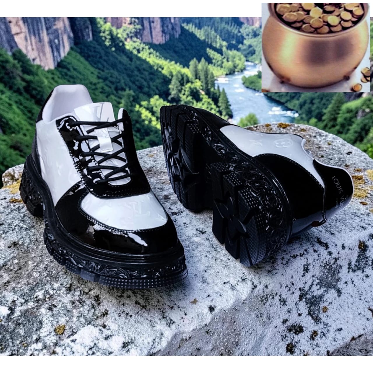 LV Archlight patent leather chunky sneaker in black and white colourway, displayed on a granite rock with a scenic mountain river backdrop — side and sole view