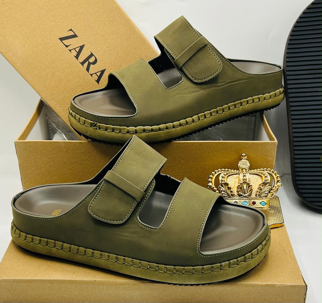 Zara olive army green double-strap platform sandals with wide toe strap, adjustable velcro upper strap, chunky platform footbed with contrast midsole stitching, and ridged black rubber outsole on Zara kraft box — 100% authentic men's luxury sandals