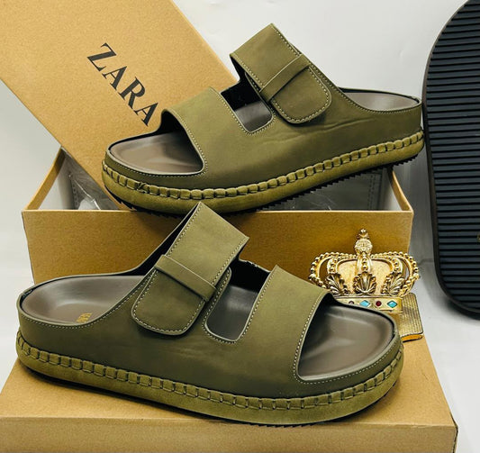 Zara olive army green double-strap platform sandals with wide toe strap, adjustable velcro upper strap, chunky platform footbed with contrast midsole stitching, and ridged black rubber outsole on Zara kraft box — 100% authentic men's luxury sandals