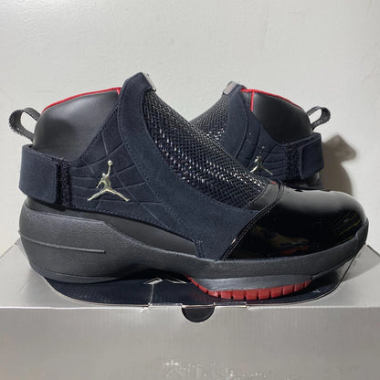 Nike Air Jordan 19 OG high-top sneakers in black and red Bred colourway with carbon fibre woven cage, patent leather toe cap, silver Jumpman hardware, and red rubber outsole — 100% authentic collector Jordan sneakers