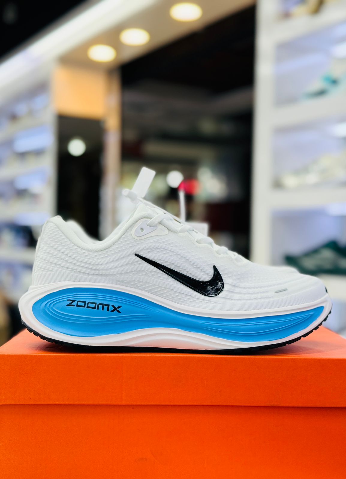 Nike ZoomX Vomero Running Sneakers – White/Blue
